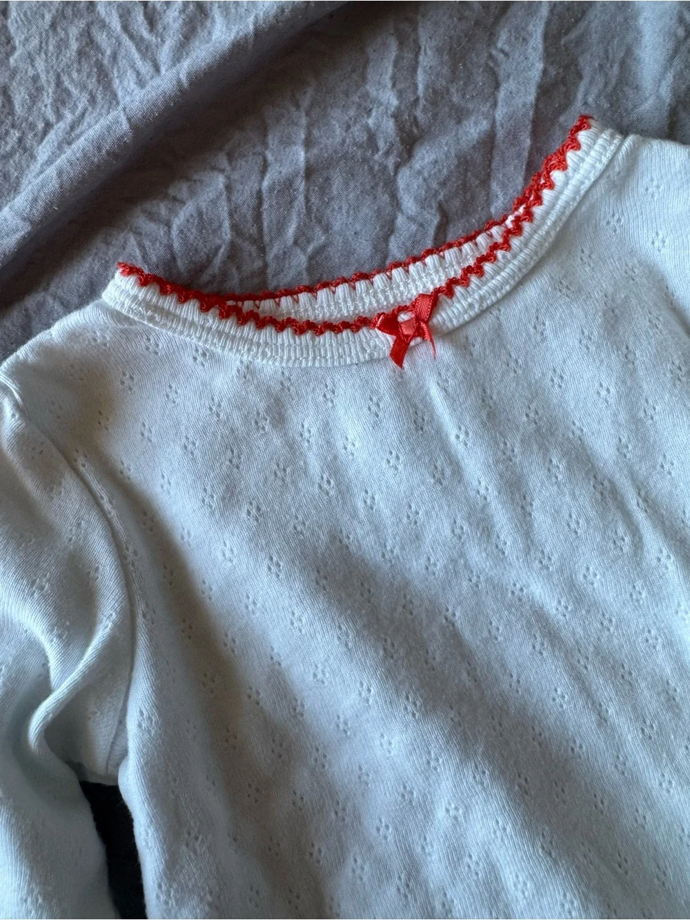 Classic White Baby One-Piece with Orange Trim